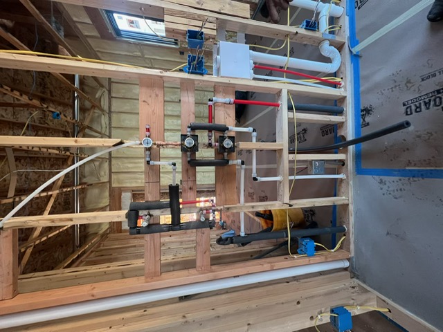PEX manifold and water distribution rough-in in a new construction home