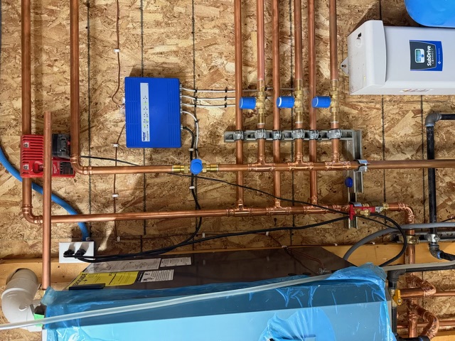 Custom copper radiant heat manifold and water service installed by Aaron's Plumbing in Helena, MT